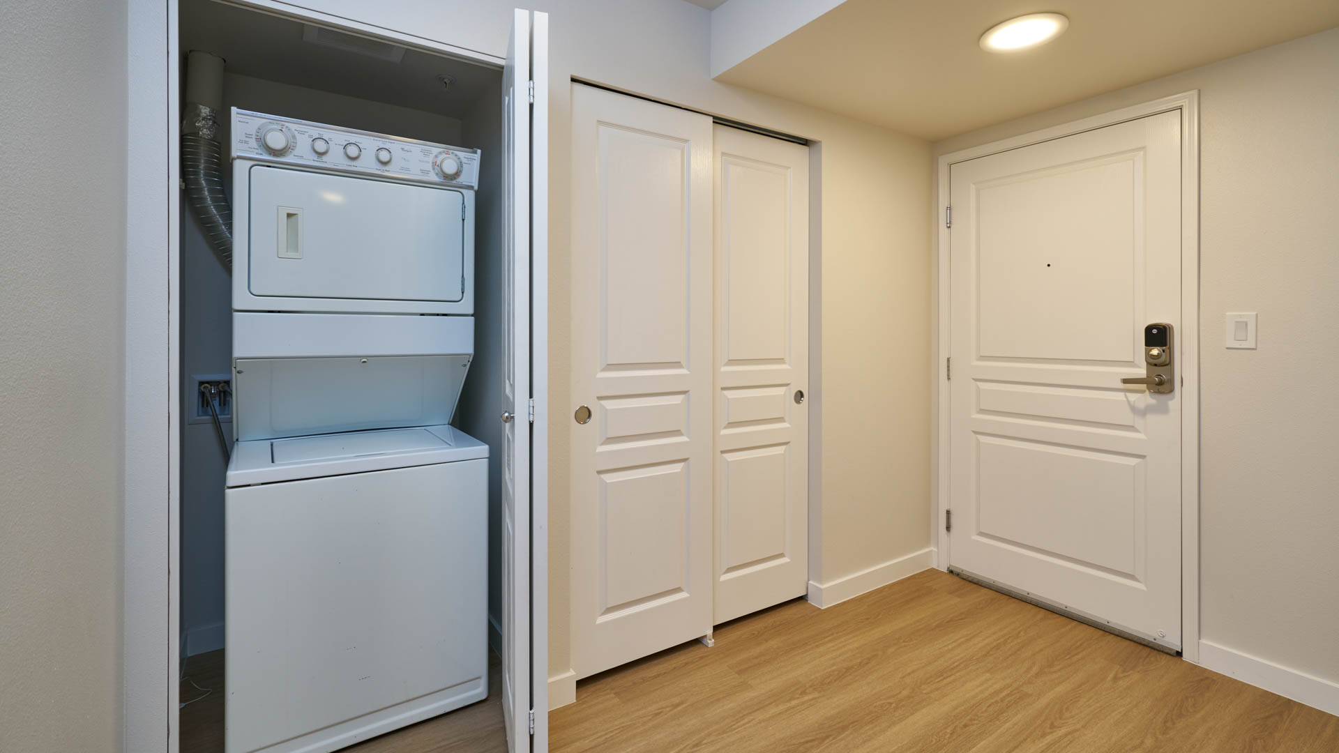 Laundry room at Olympus Apartments