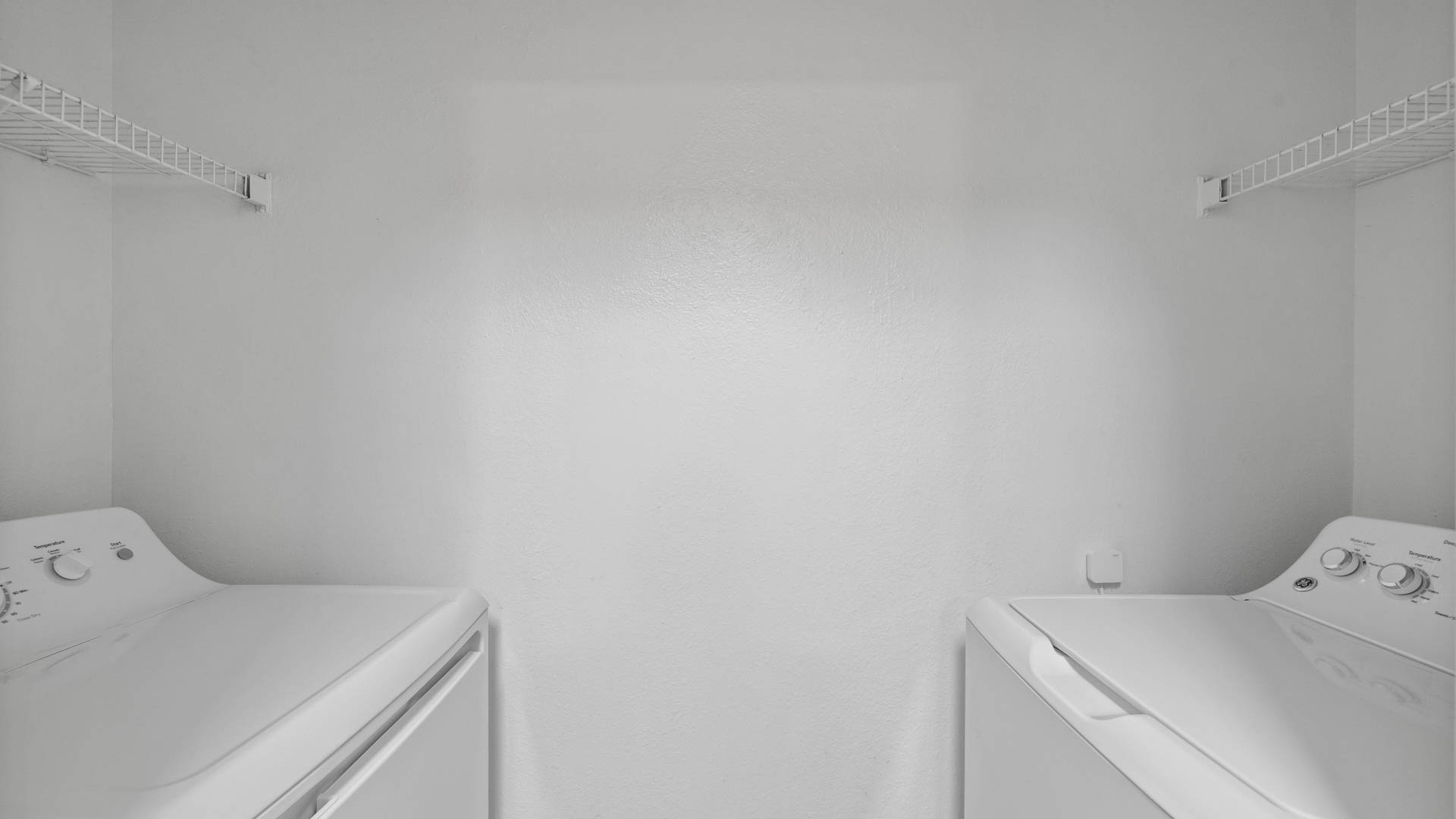 Laundry room at Reserve at Potomac Yard Apartments (2 of 2)