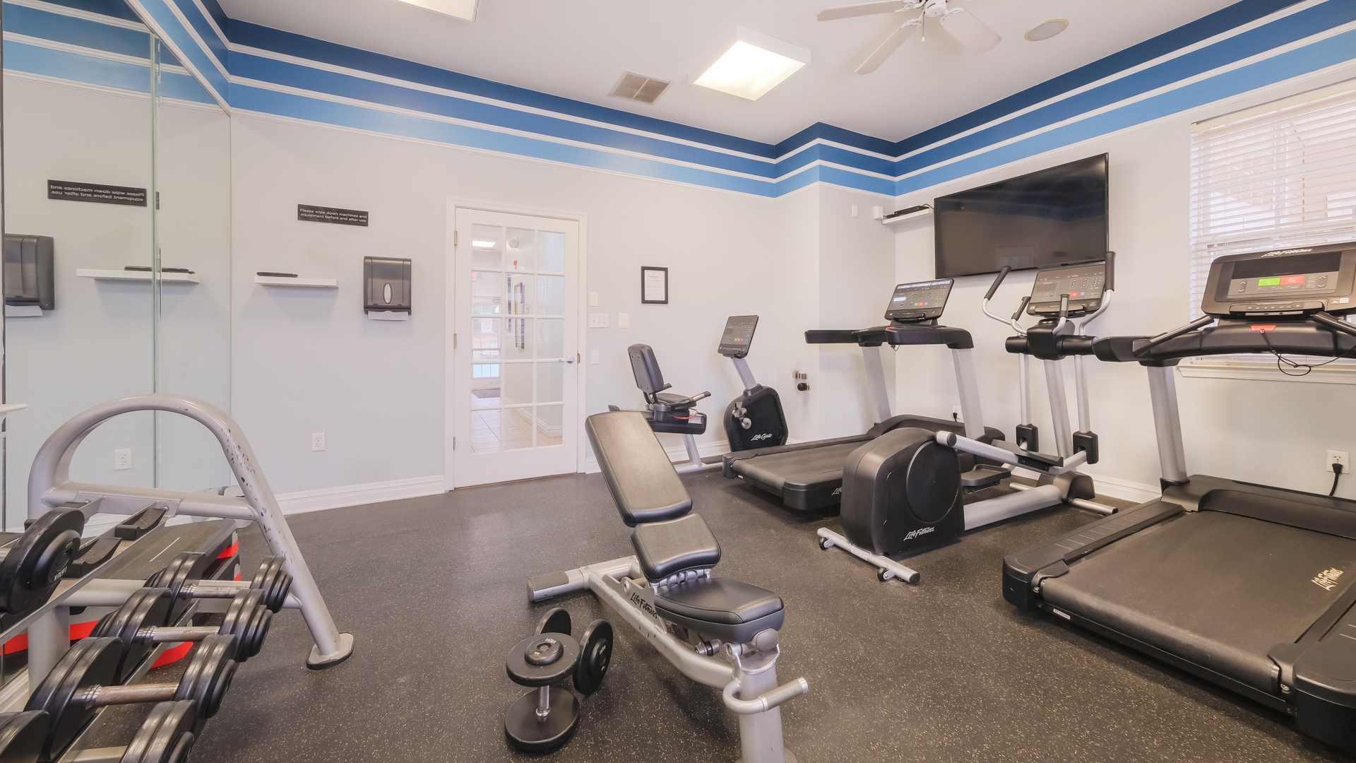 Gym at The Highlands at South Plainfield Apartments (2 of 2)
