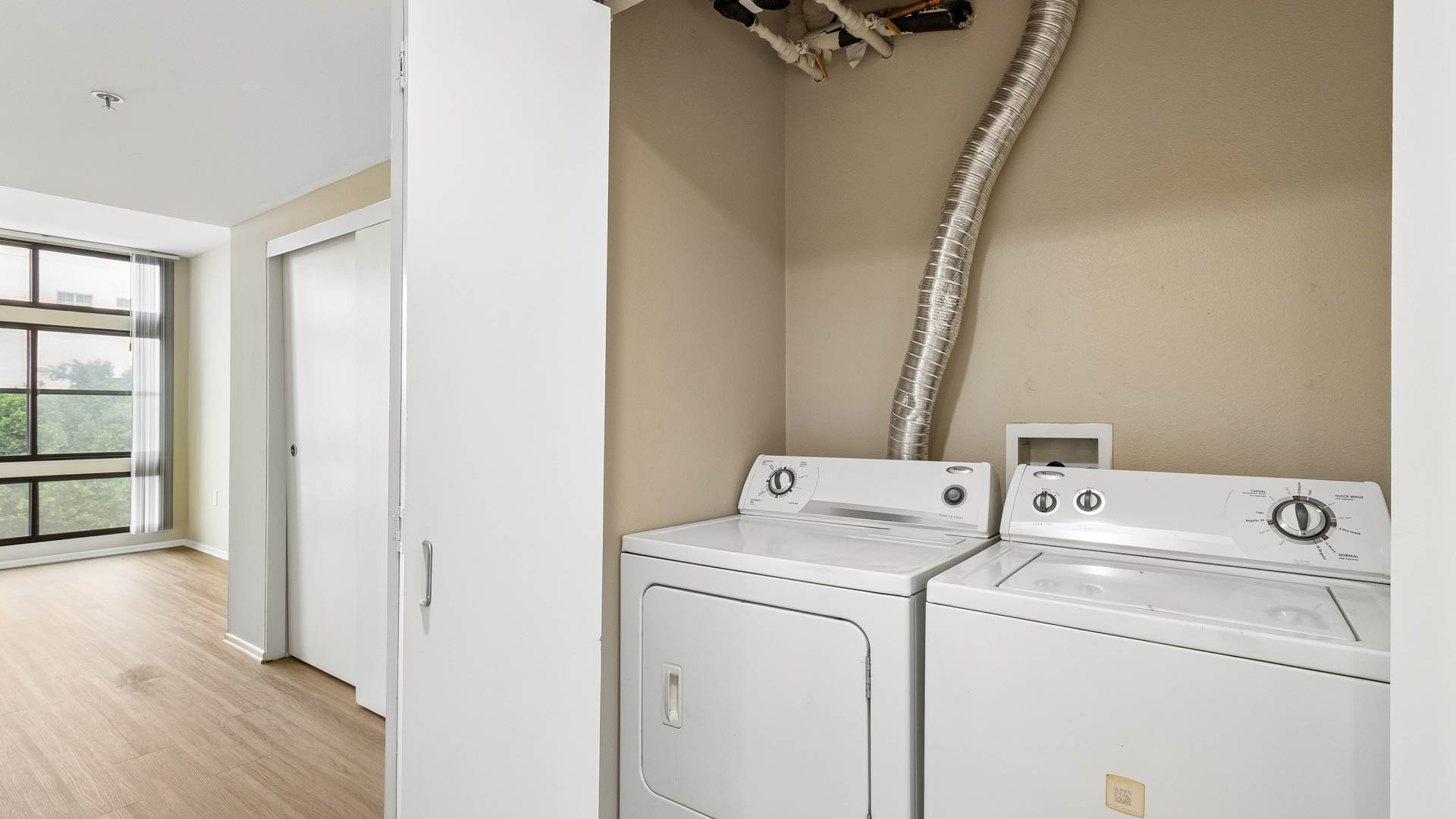 Laundry room at Mozaic at Union Station Apartments (2 of 2)