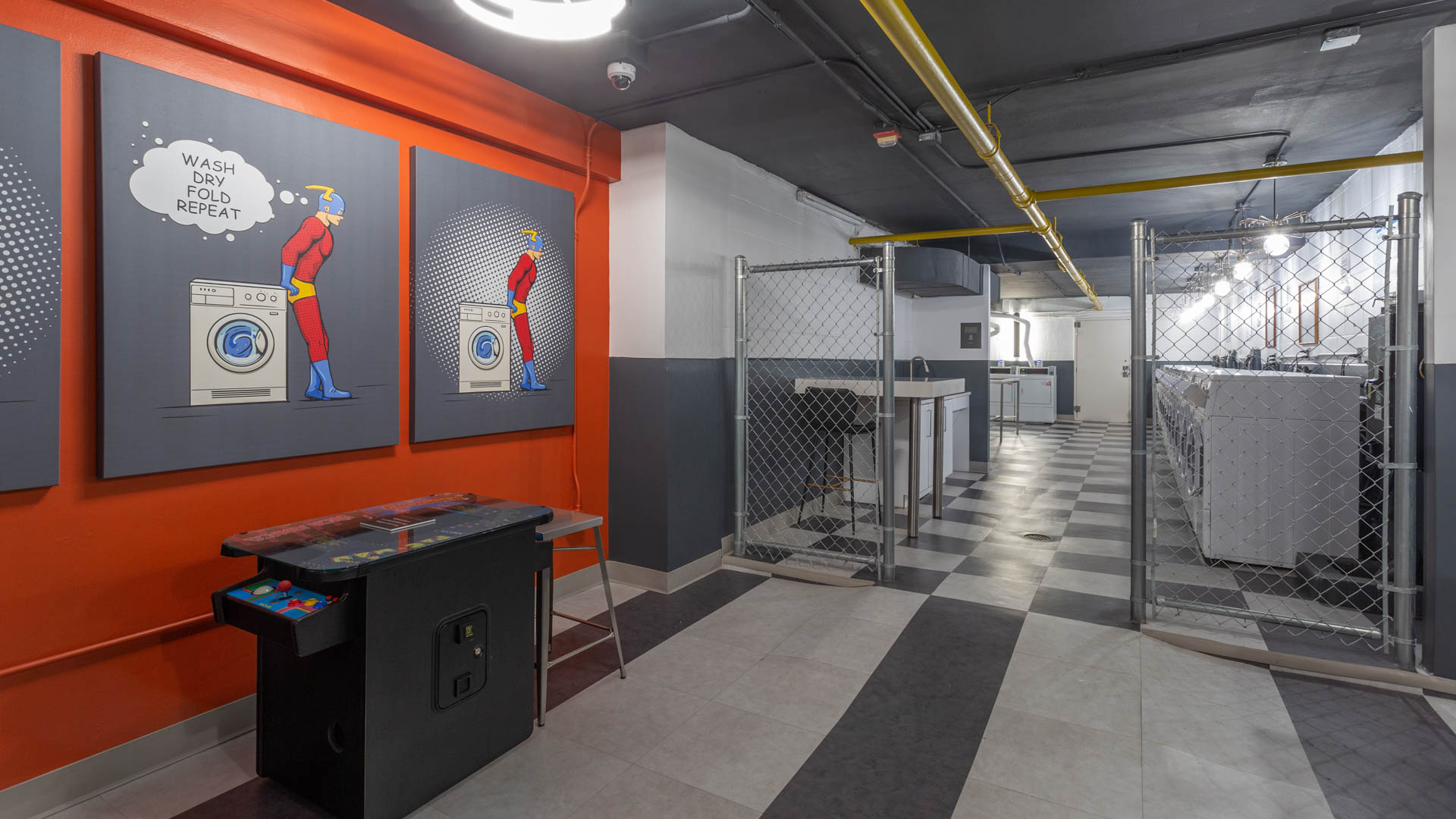 Laundry room at 1500 Mass Apartments (2 of 2)