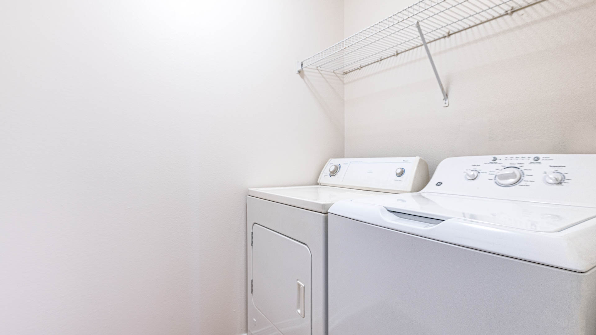 Laundry room at Belle Fontaine Apartments