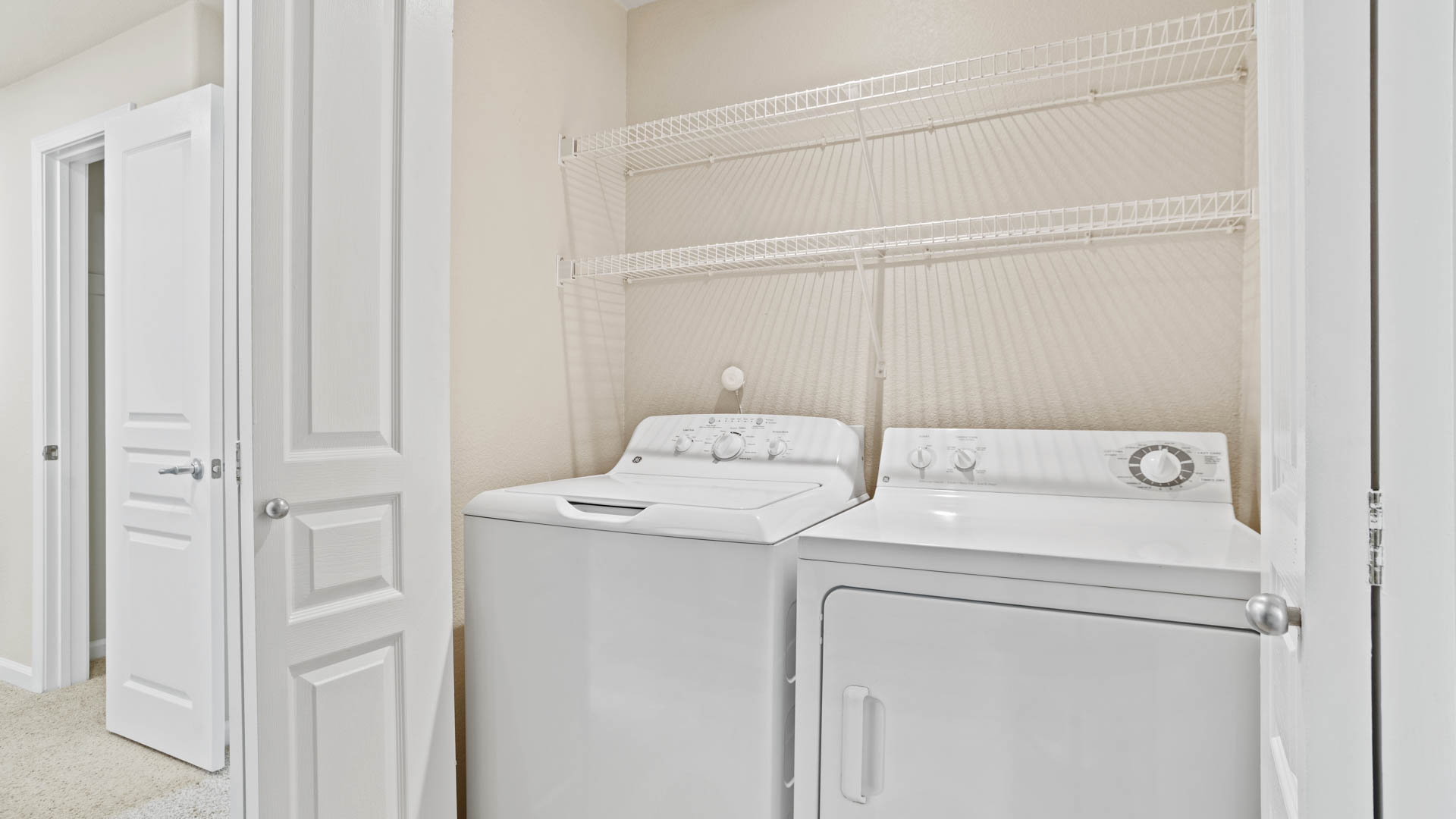 Laundry room at Estancia at Santa Clara Apartments