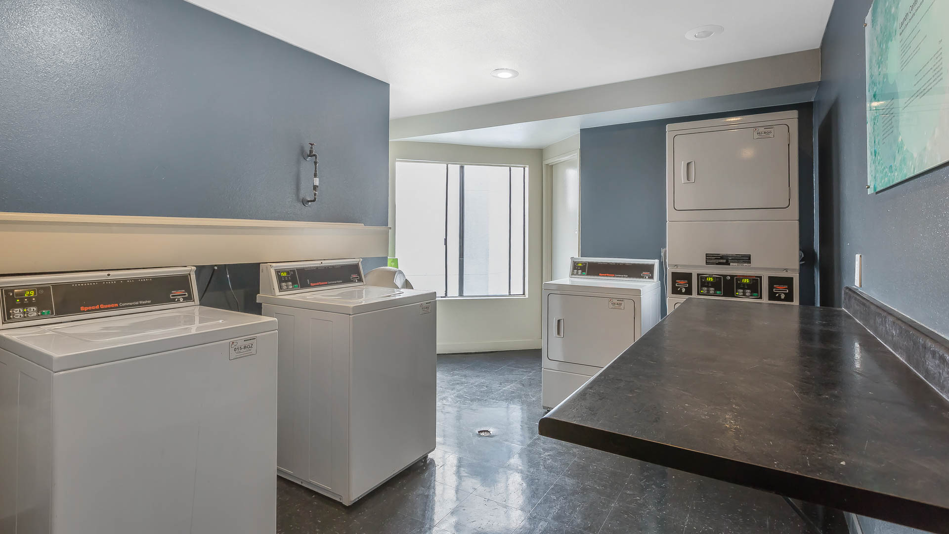 Laundry room at Prado Apartments