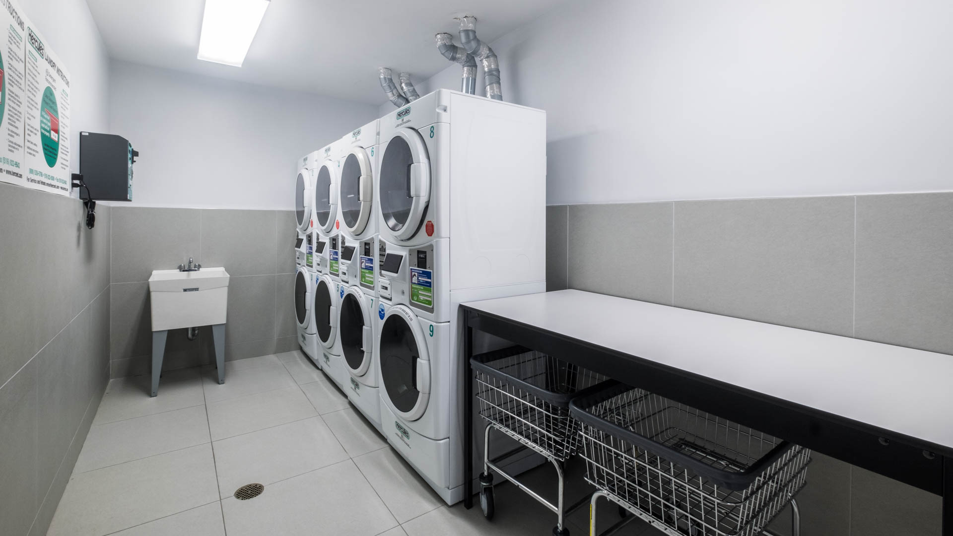 Laundry room at Atelier Apartments