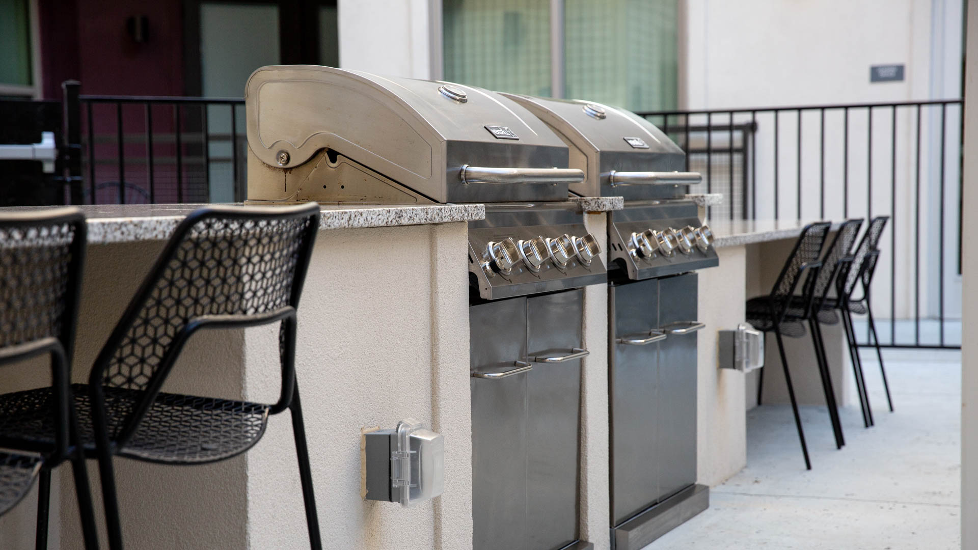 Grill area at Flora Apartments