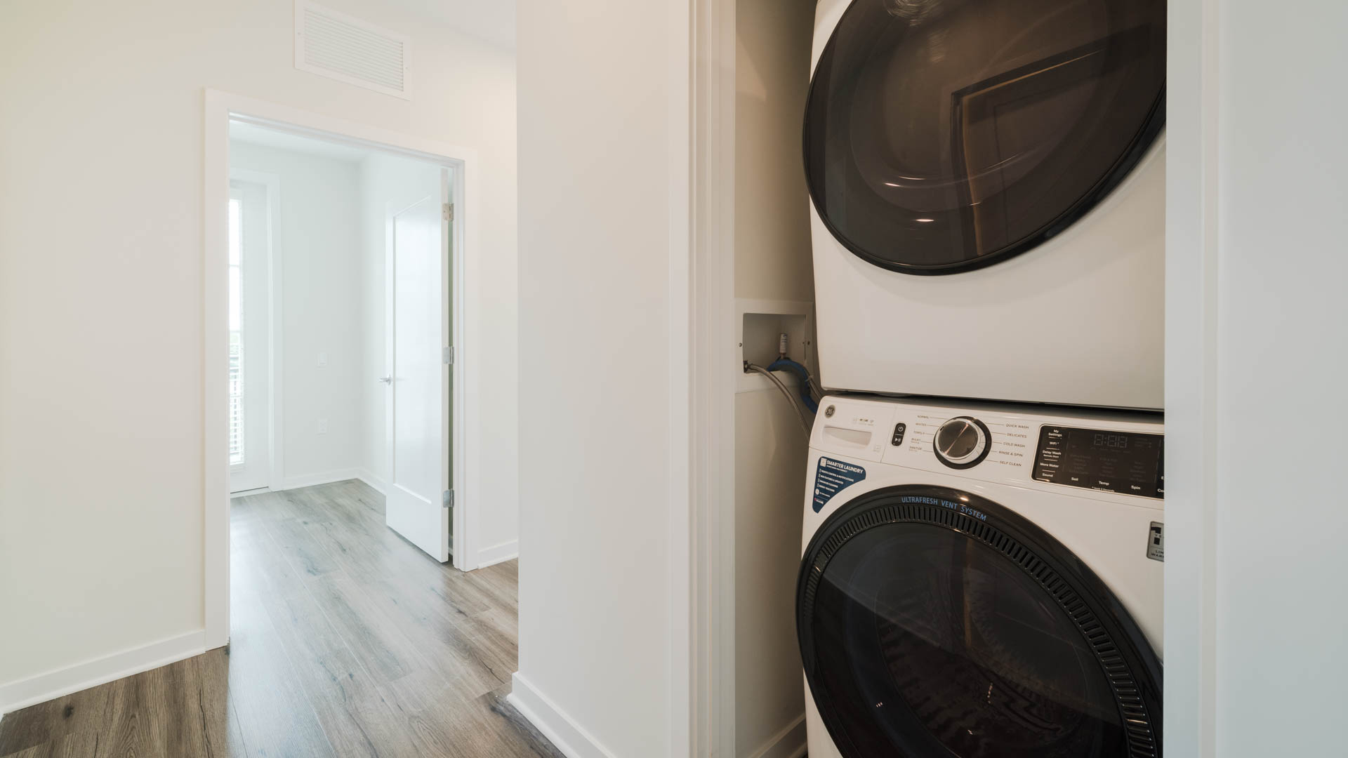 Laundry room at Alexan Harrison Apartments (4 of 4)