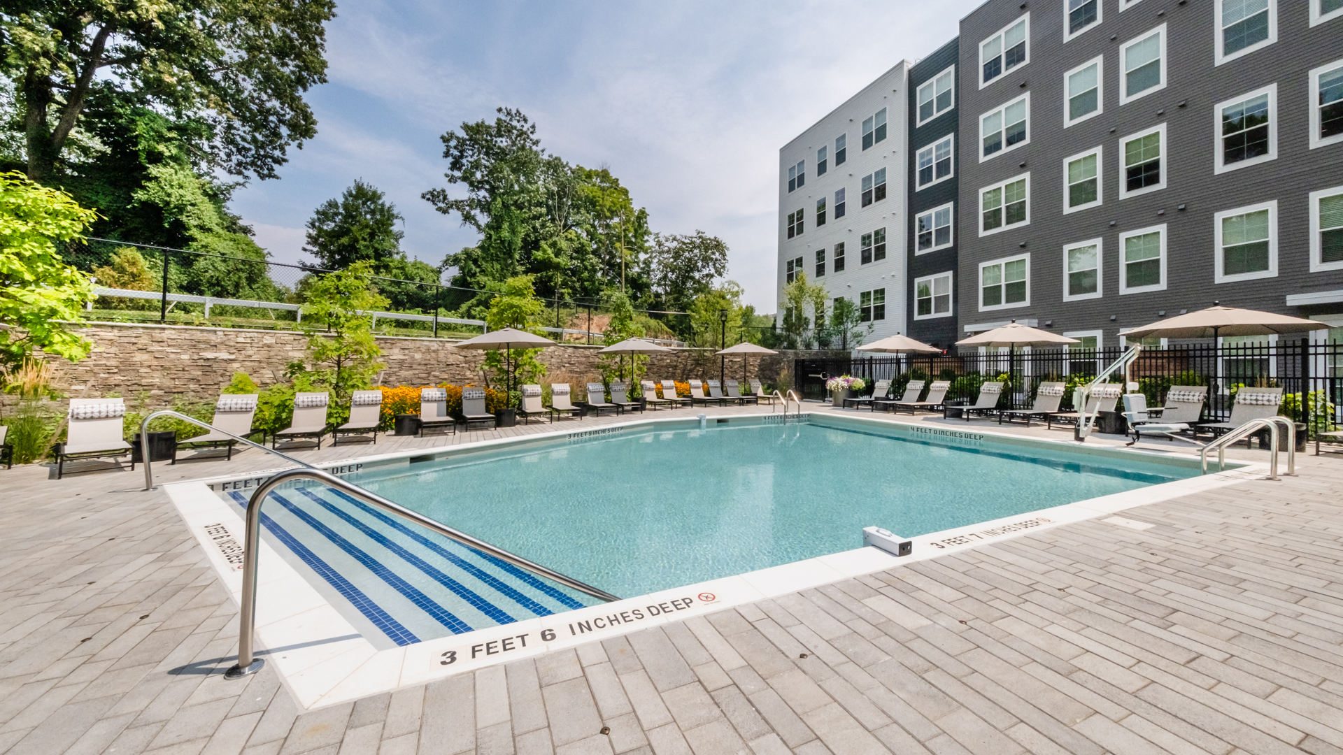 Pool at Alexan Harrison Apartments (2 of 2)