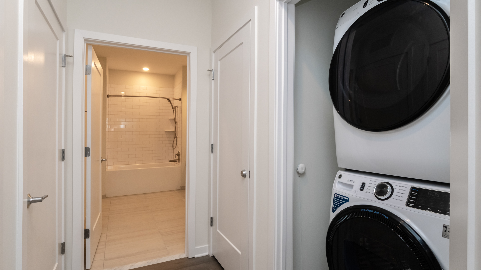 Laundry room at Alexan Harrison Apartments (2 of 4)