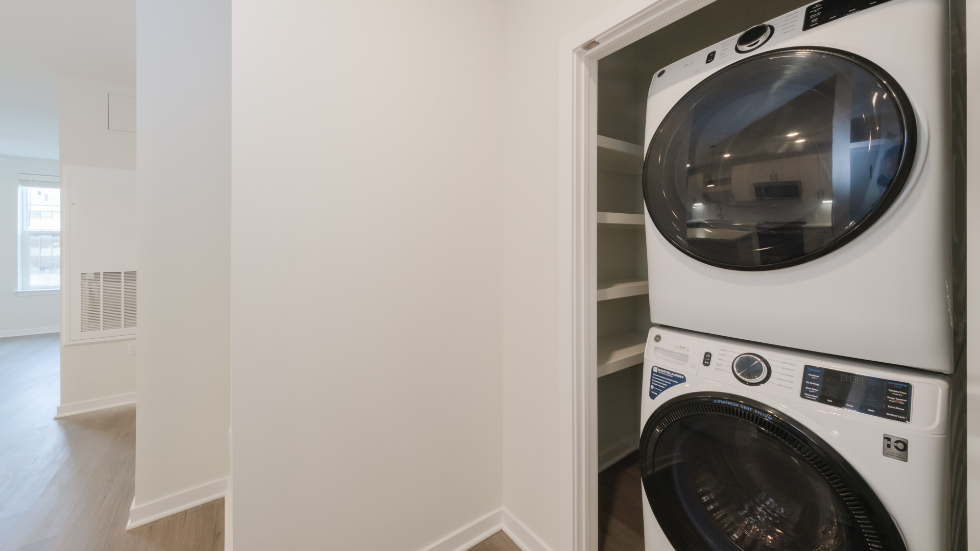 Laundry room at Alexan Harrison Apartments (1 of 4)