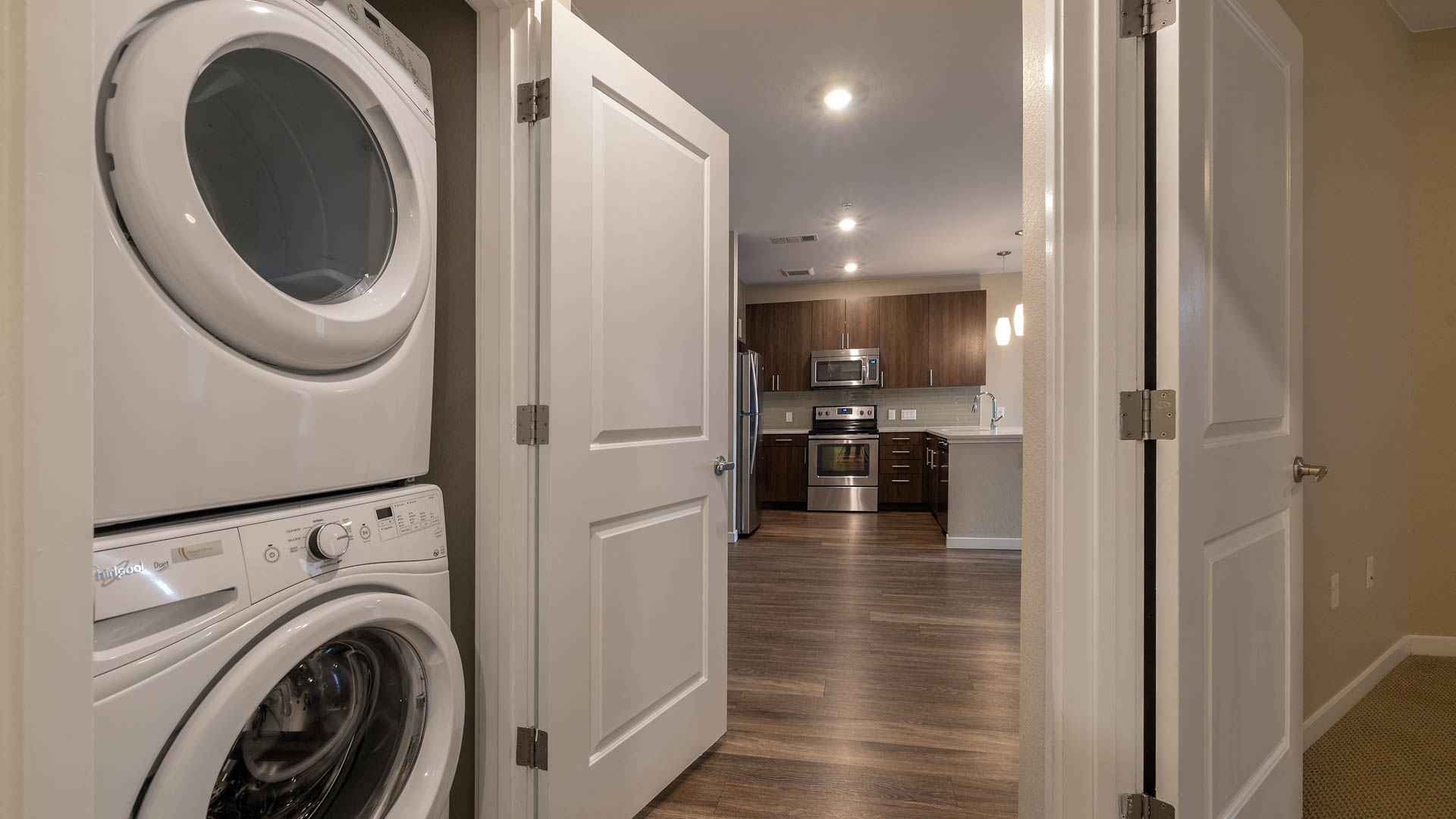 Laundry room at The Den Apartments