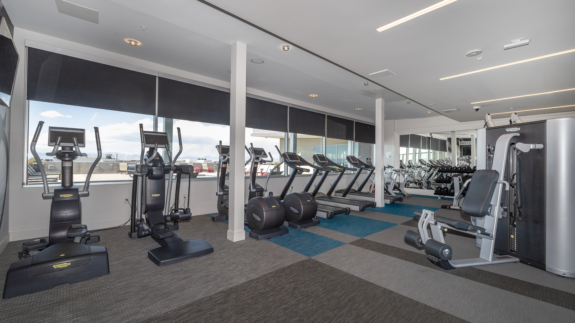Gym at The Den Apartments