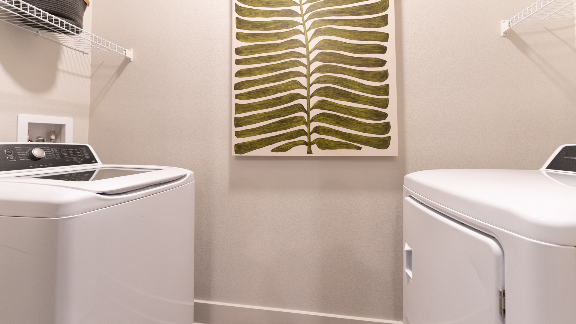 Laundry room at Ayla Stonebriar Apartments