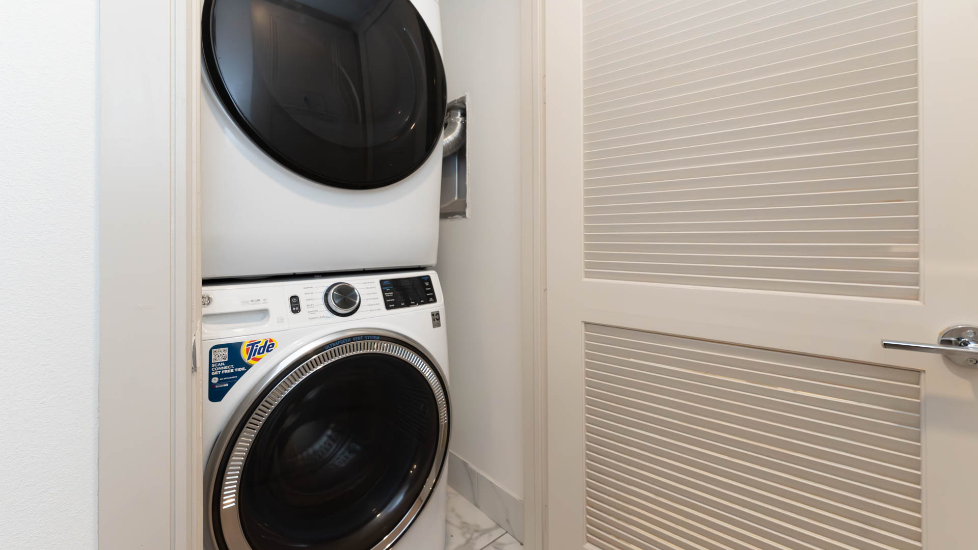 Laundry room at The Louise Apartments