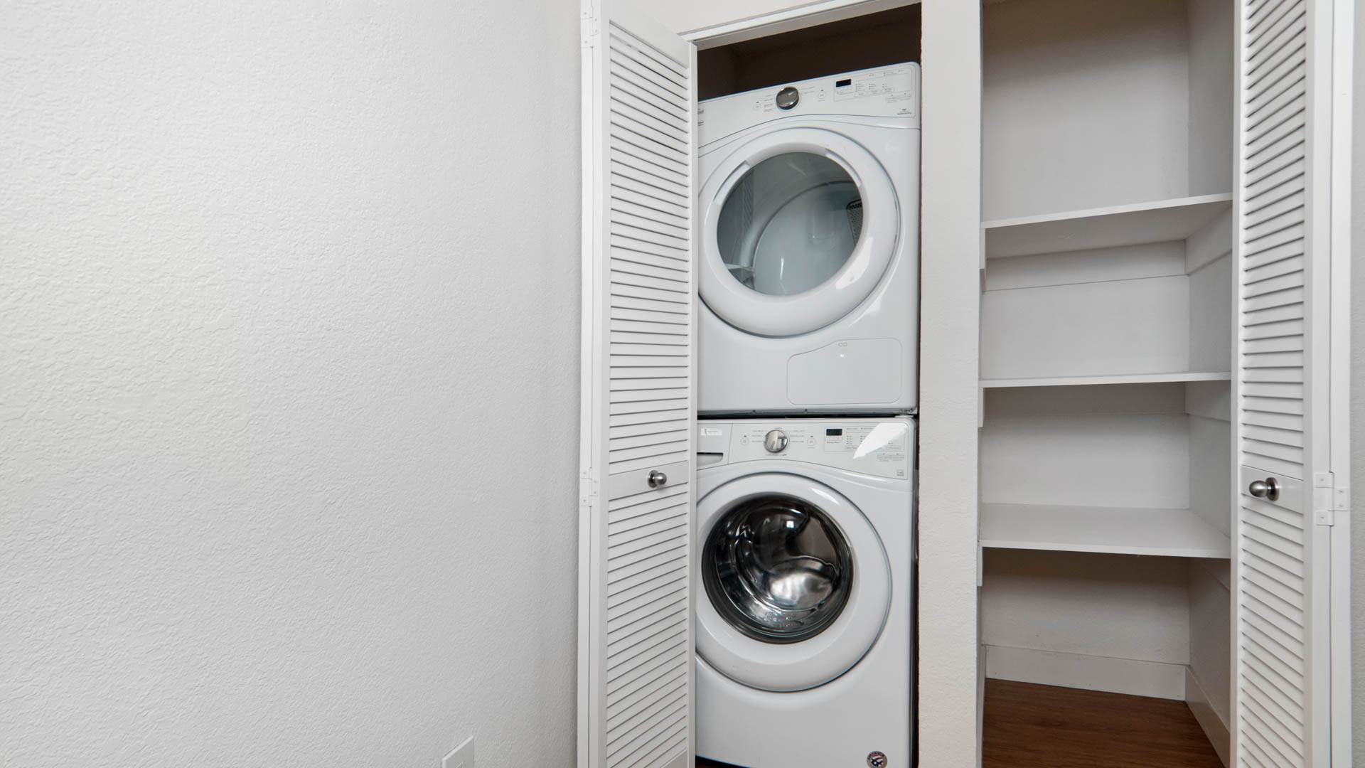 Laundry room at Arbor Terrace Apartments