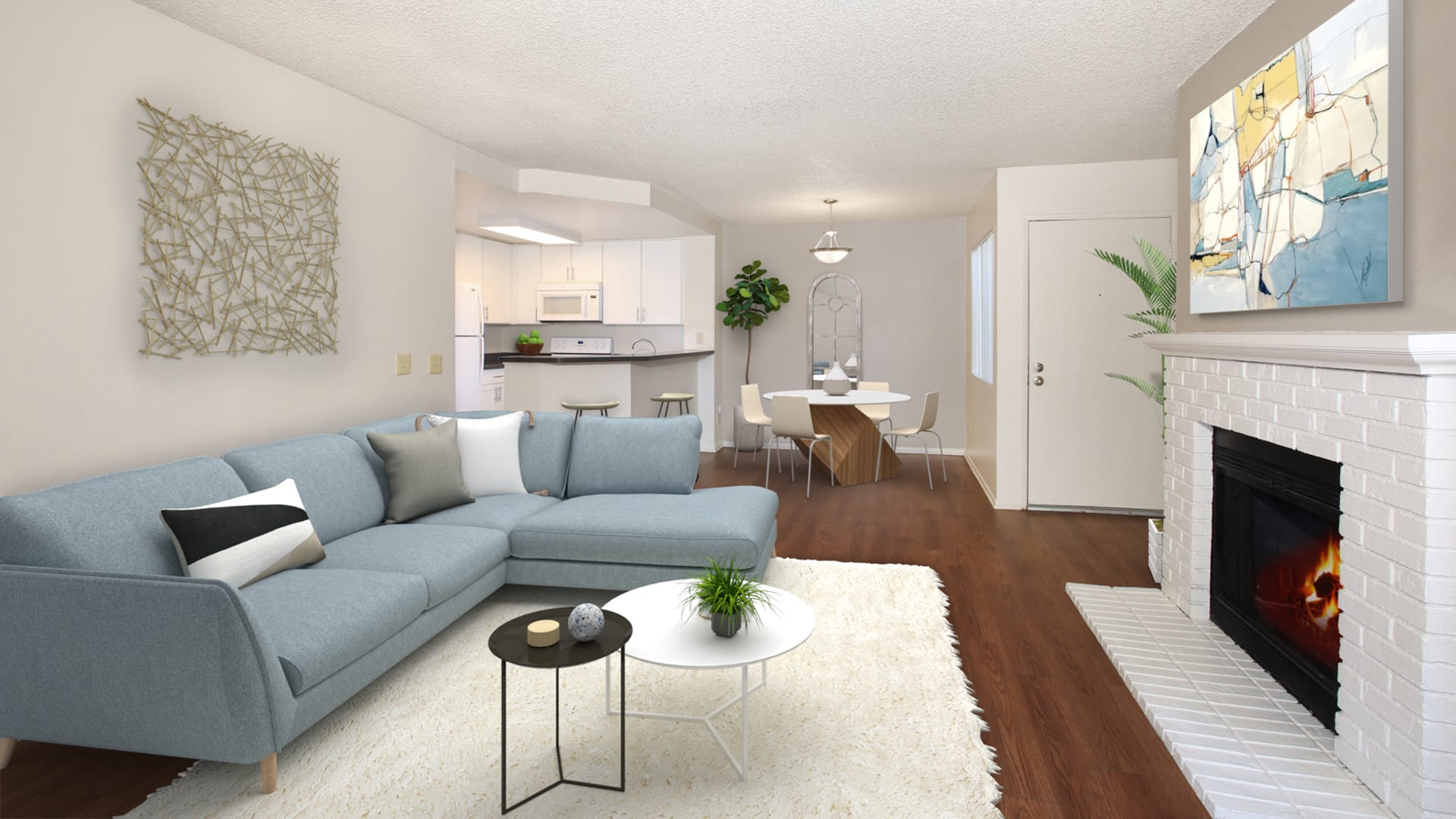 Villa Solana Apartments - Living Room with Hard Surface Flooring and Fireplace