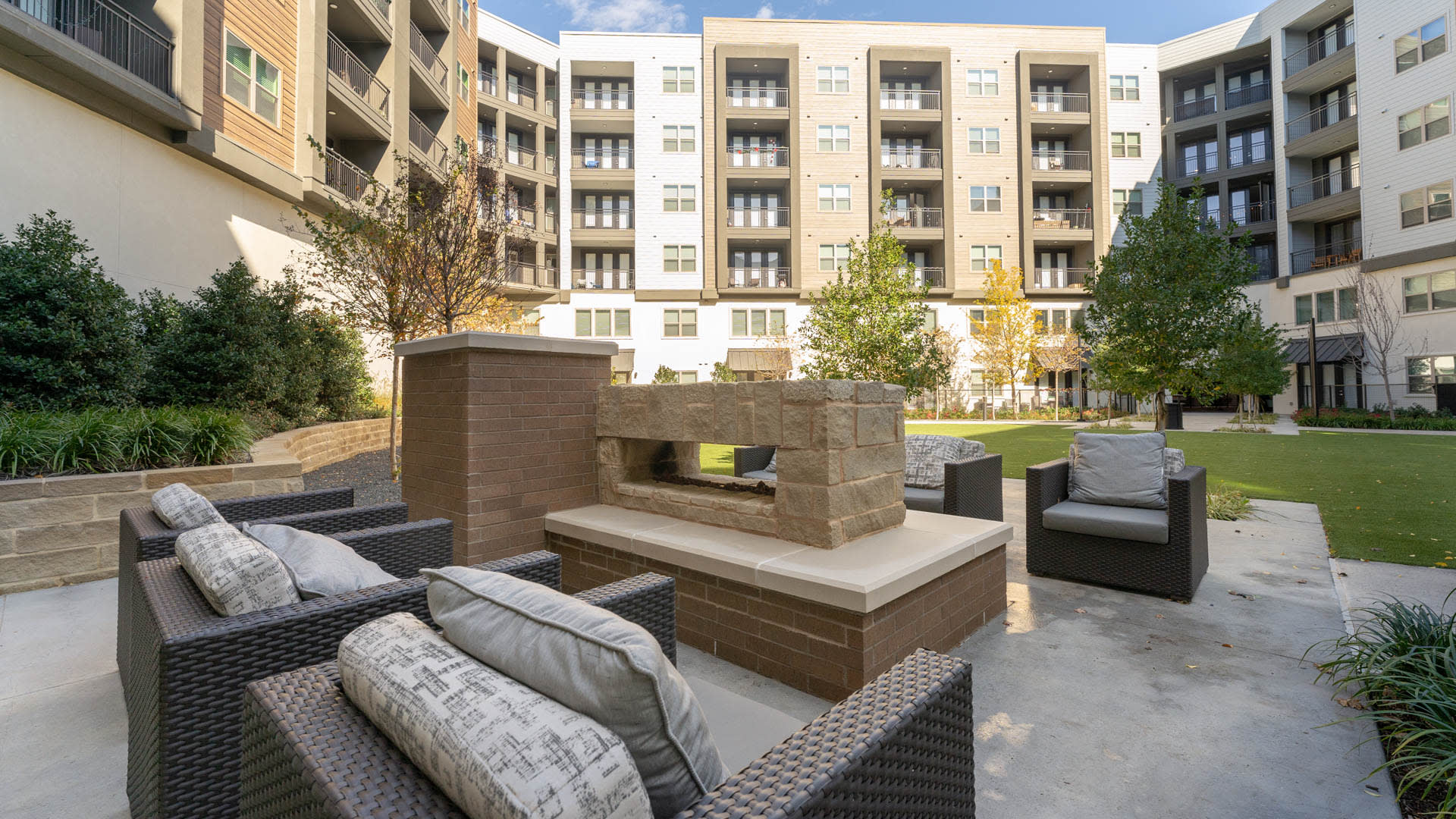 Olivian at the Realm Apartments - Outdoor Lounge with Fireplace